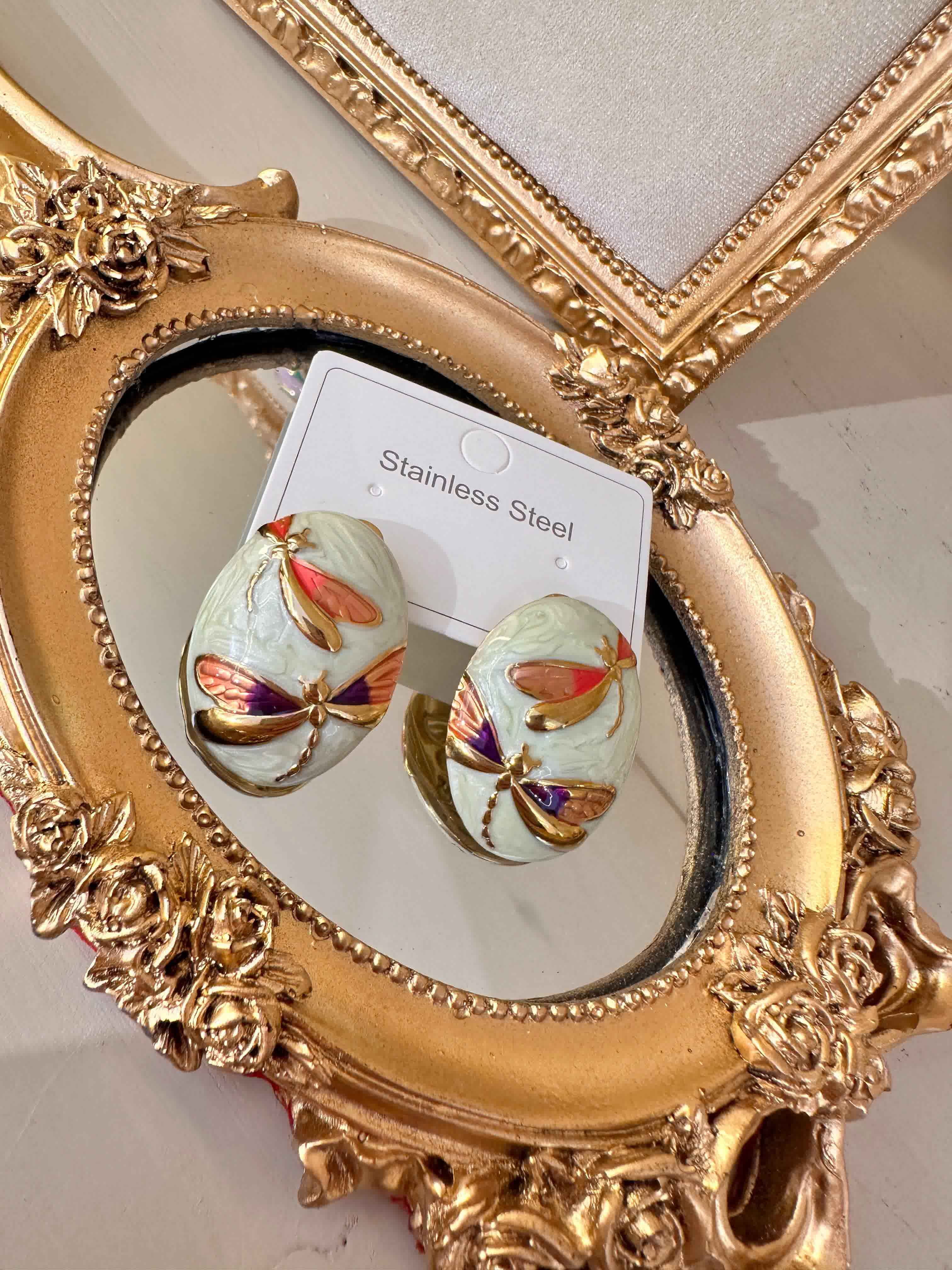 boucle resine papillon 