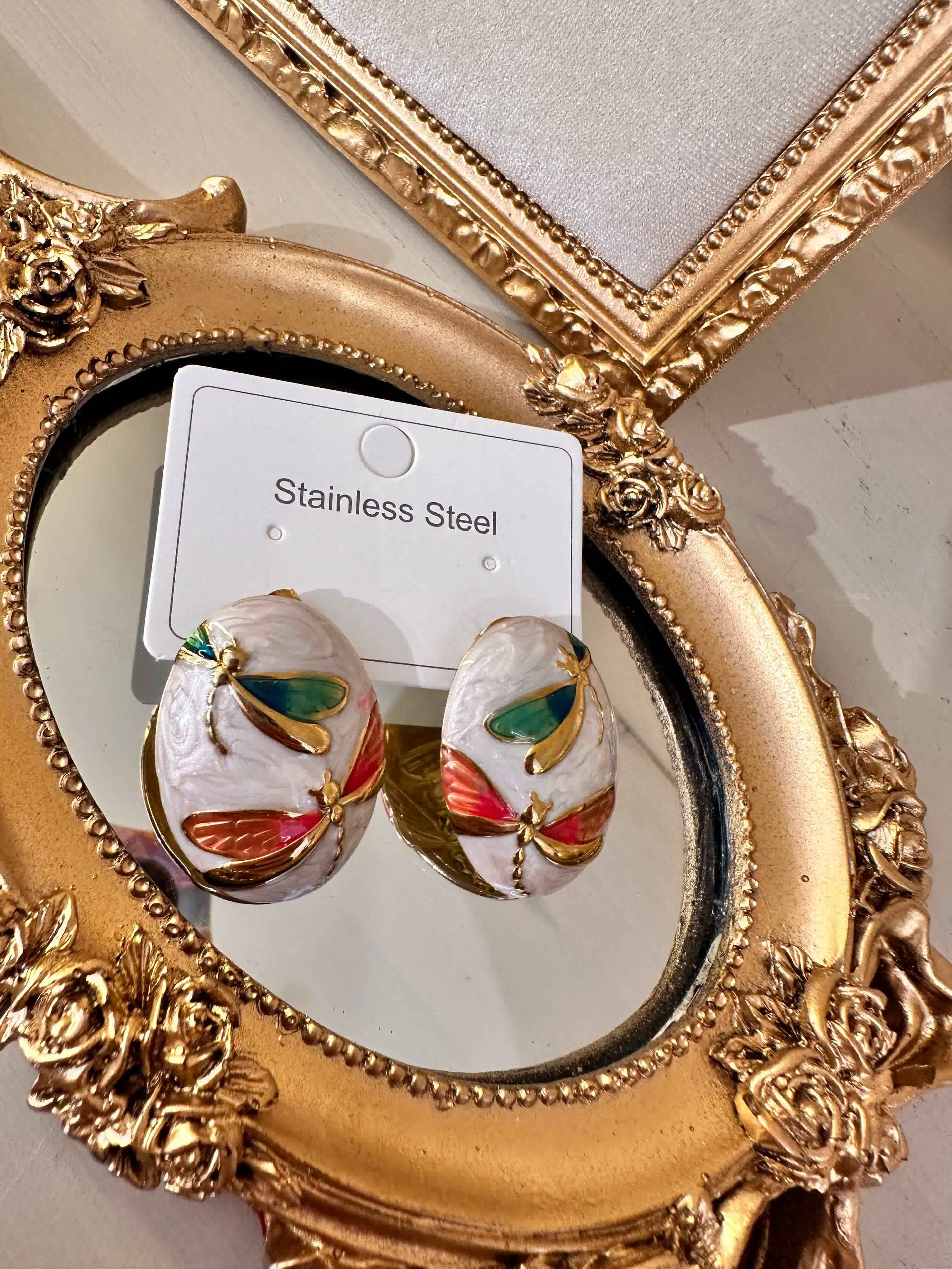 boucle resine papillon 