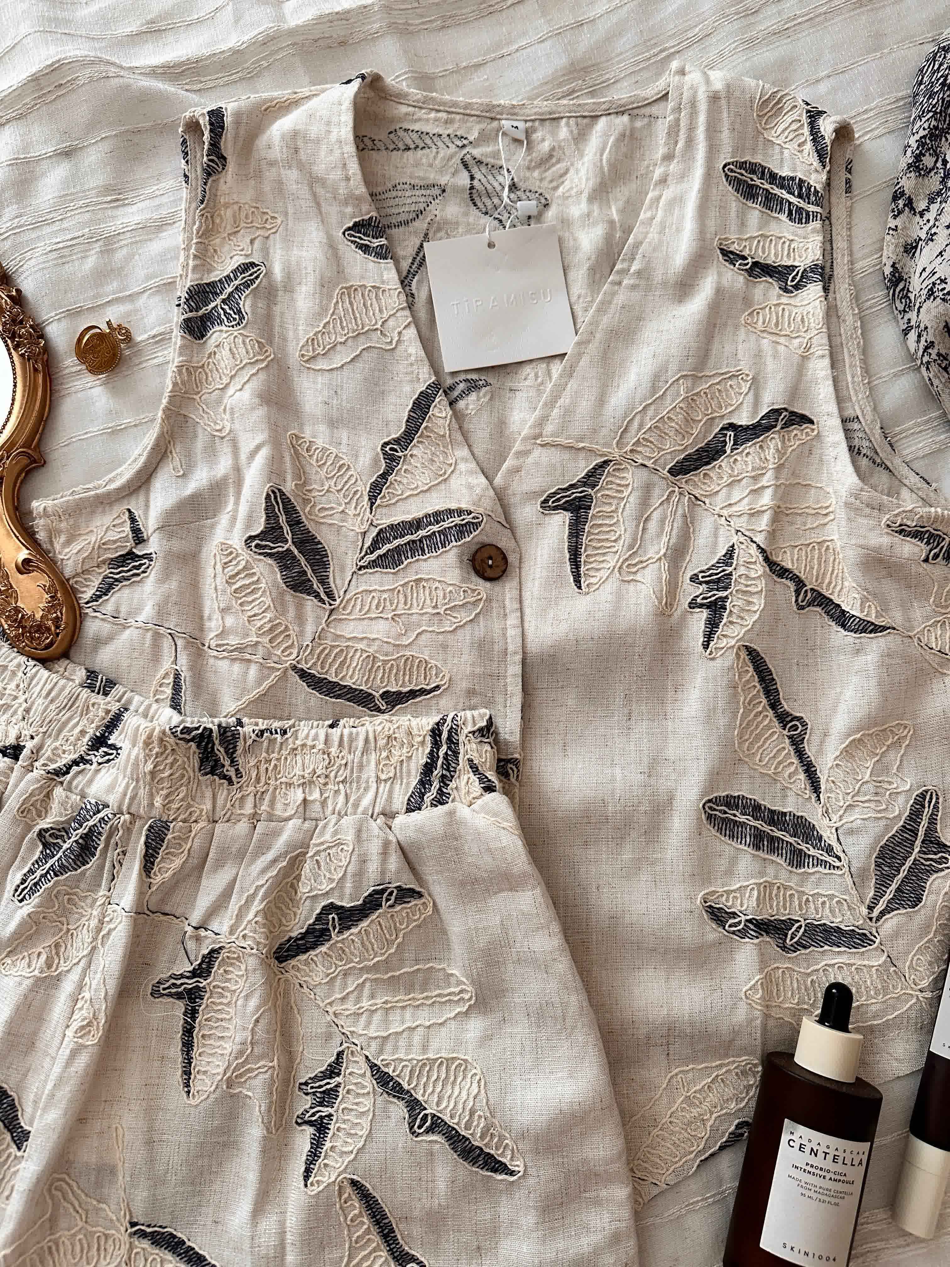 Gilet short fleuri Tiramisu 