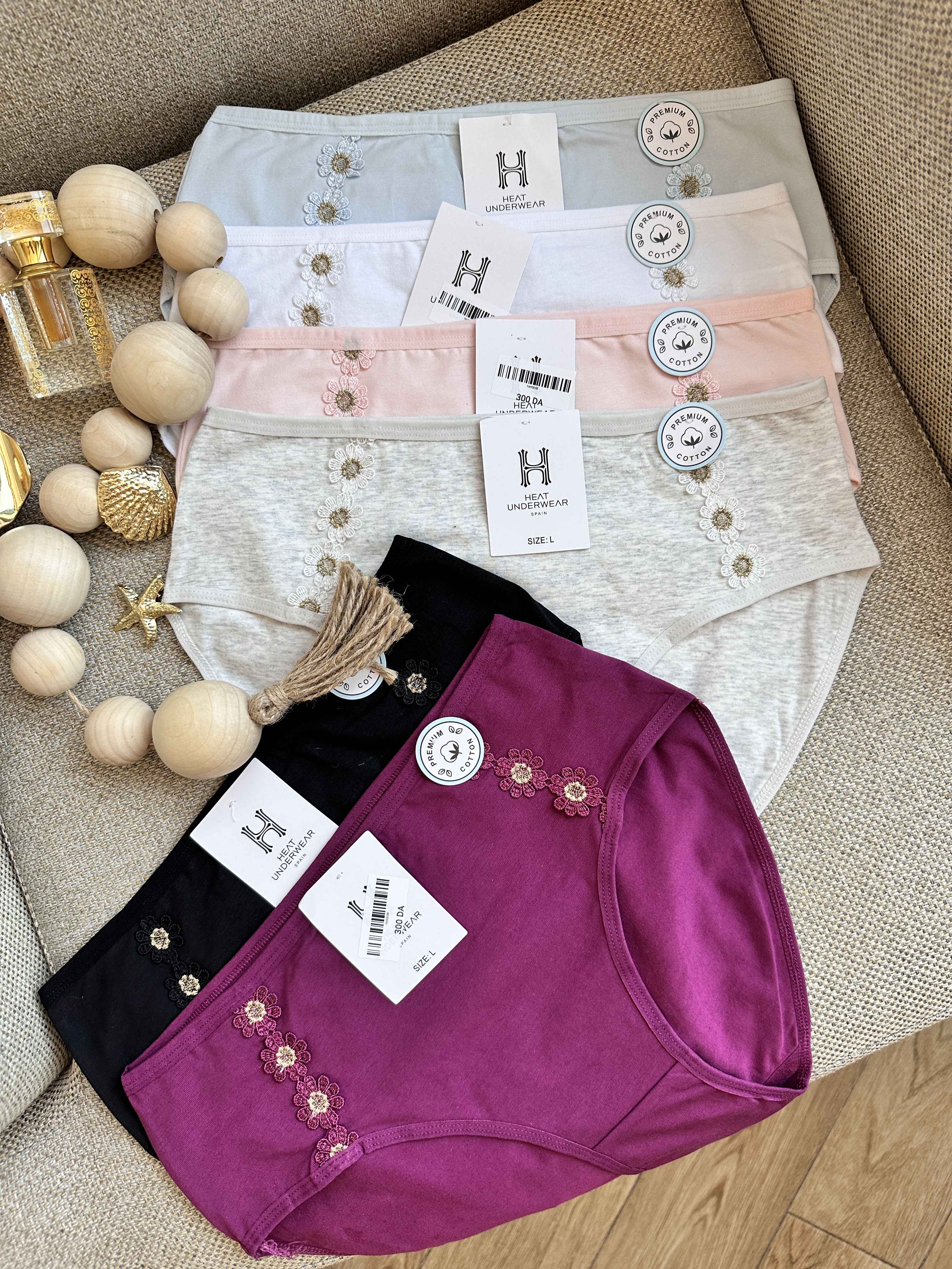 slip H fleur a coté