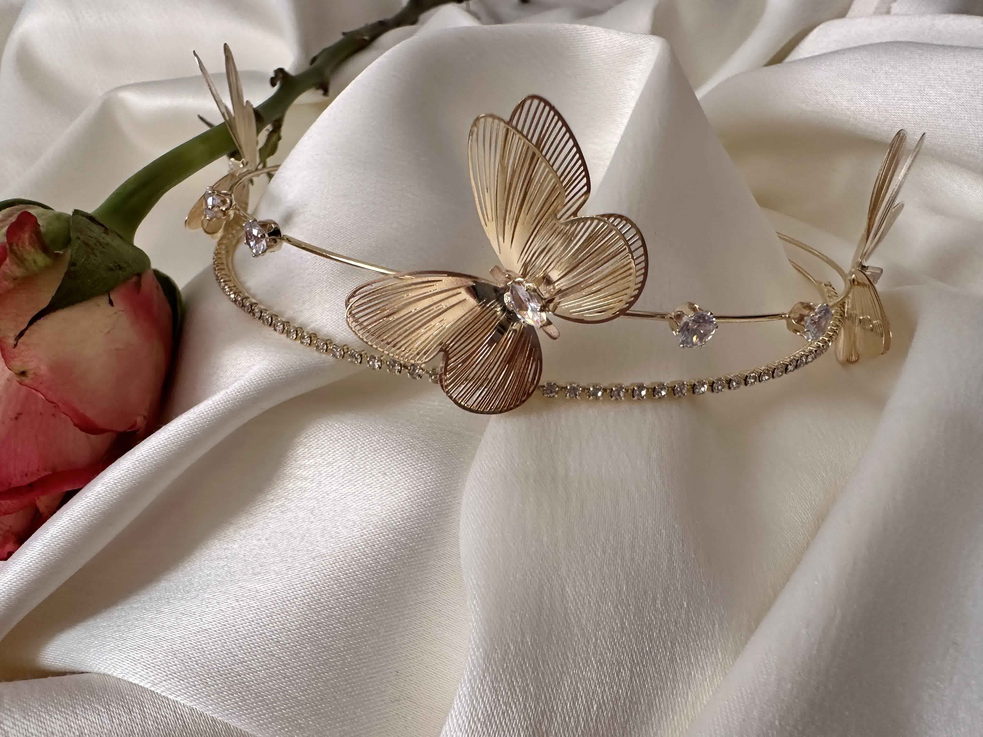 Serre-tete metalique papillon