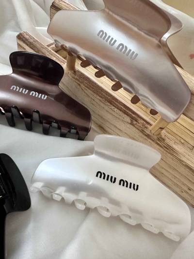 Attache miumiu brillant
